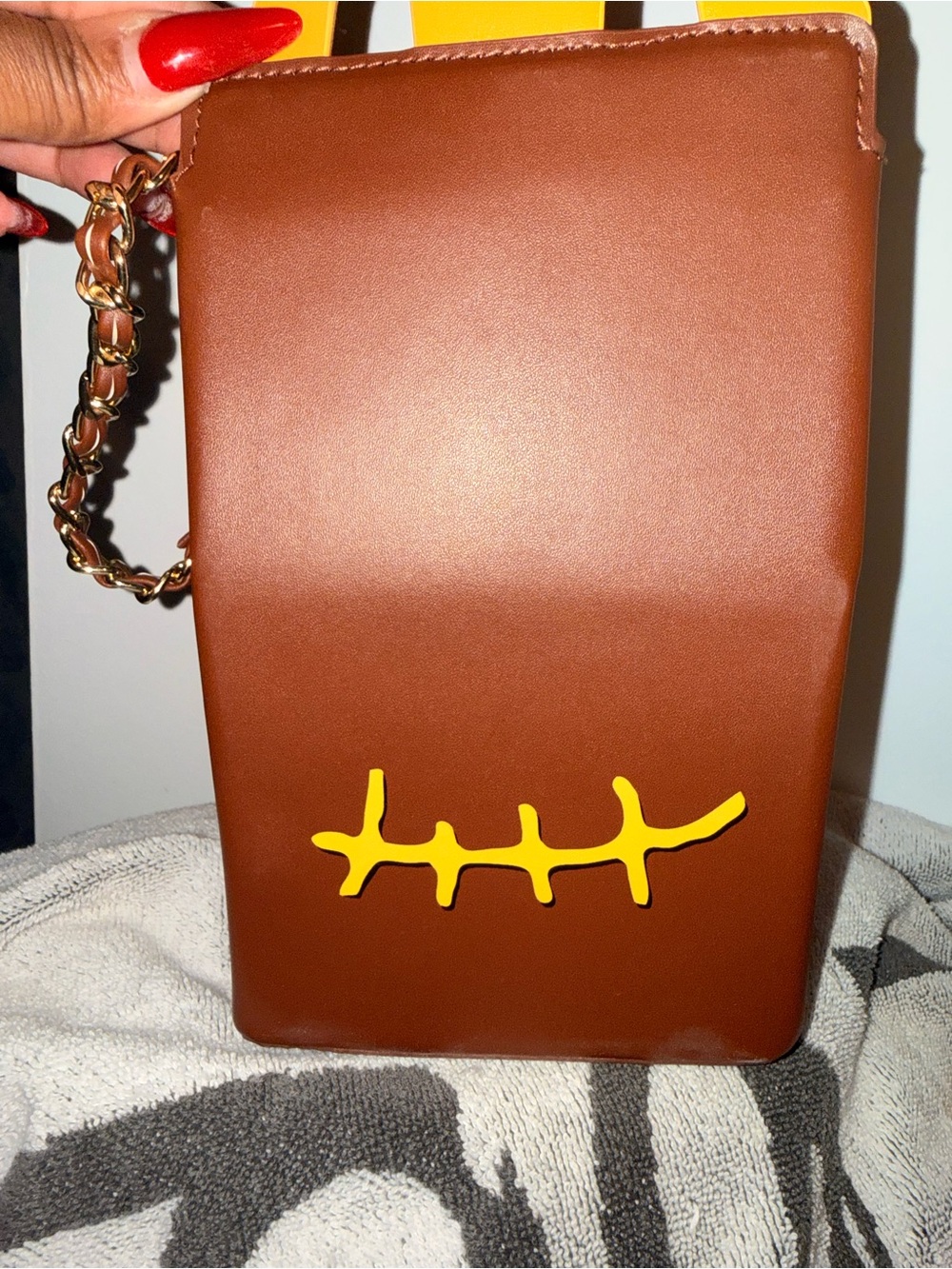 Travis Scott Brown Crossbody with Yellow Stitch Motif